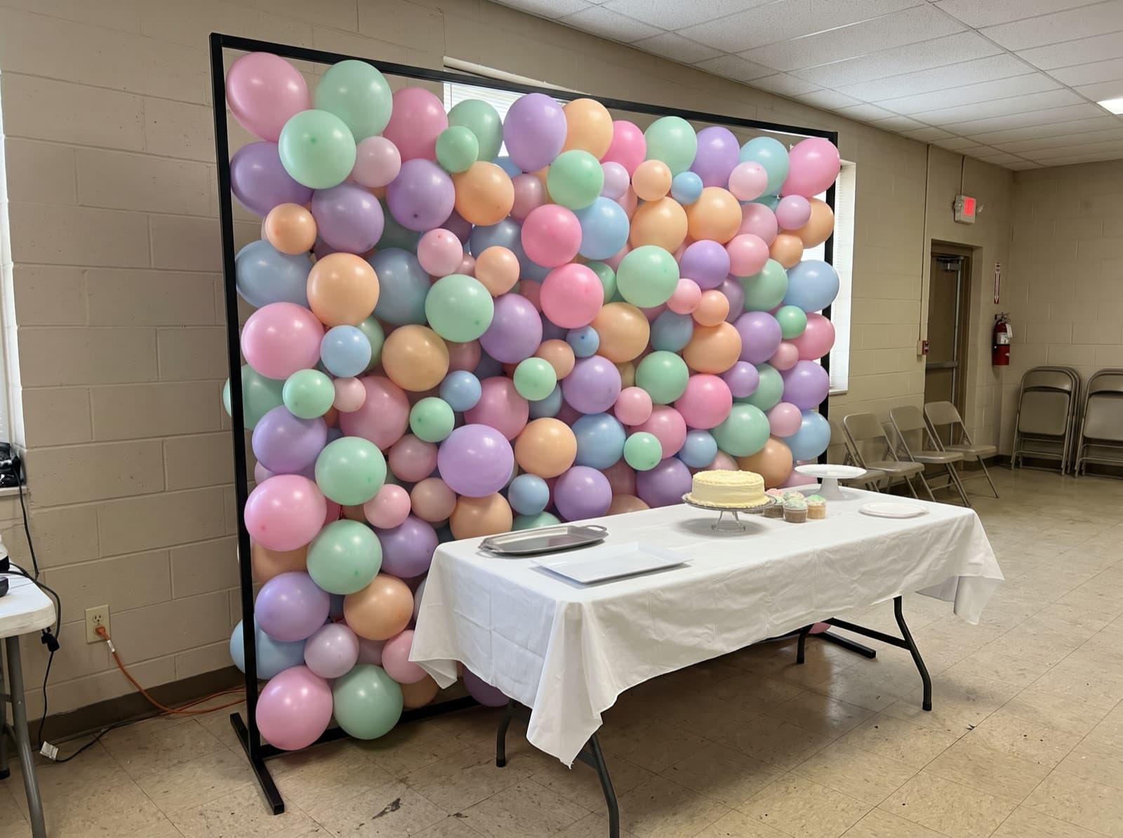 Square framed balloon wall in pastel colors